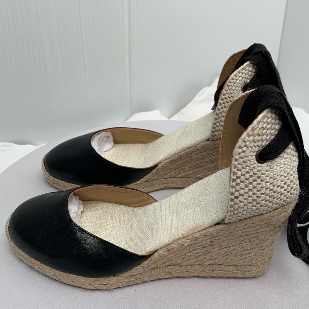 Black leather espadrilles. Lace up.